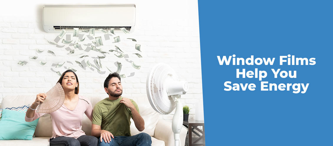 Overheated Couple Sitting Wishing They Had Energy-Saving Window Films As AC Blows Out Money Above Them